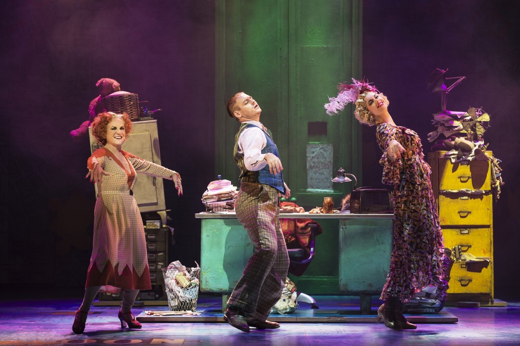 ANNIE - Lesley Joseph as 'Miss Hannigan', Jonny Fines as 'Rooster' and Djalenga Scott as 'Lily'. Photo credit Paul Coltas